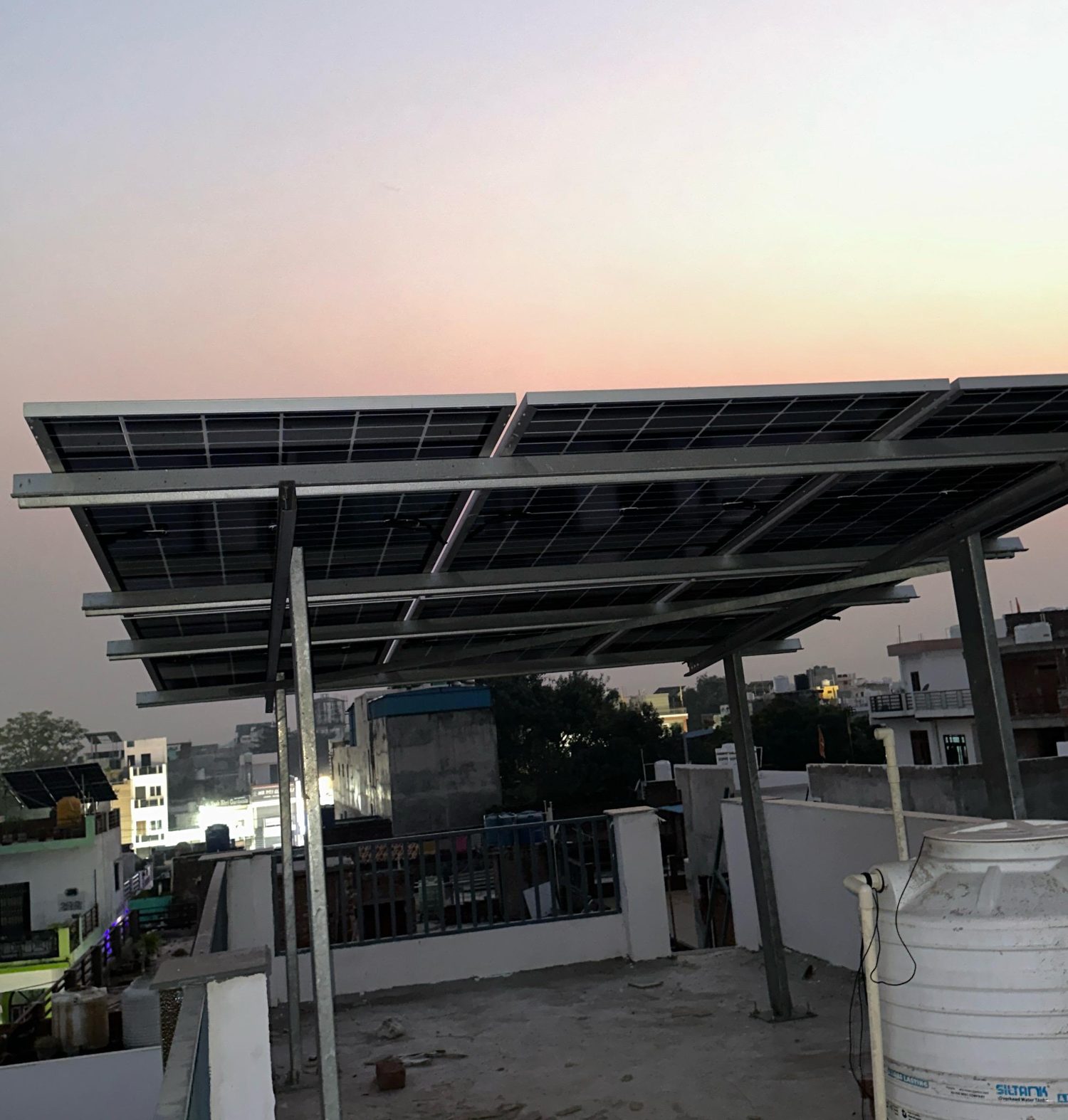 SolarSpot elevated canopy at dusk in Arjunganj, Lucknow